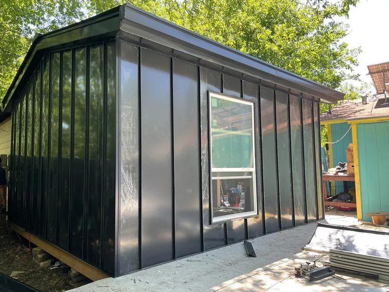 Black standing seam metal wall panels for Roof Inspection in Hampshire